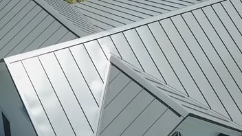 Before And After of a roof replacement project